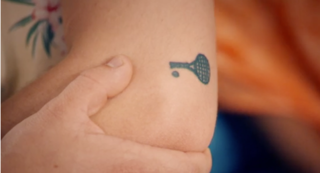 Tiny tennis tattoo