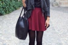 With black shirt, gray cardigan, black tote and black flat boots