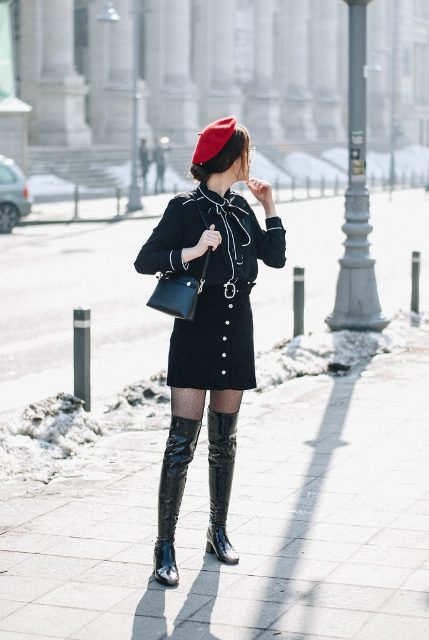With blouse, red beret, small bag and leather over the knee boots