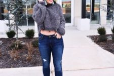 With distressed jeans and printed ankle boots