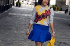 With printed sweatshirt, yellow bag and red shoes