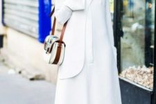 With white maxi dress, white blazer and two colored bag