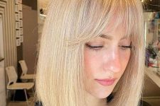 a blonde long bob with wispy bangs is a catchy and bright solution, the color is fresh and bold