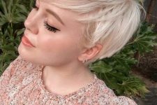 a fab icy blonde layered pixie looks soft and undone, give it more texture with feathered ends