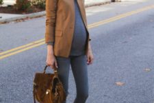 a grey long sleeve shirt, grey skinnies, beige booties, a beige blazer and a brown bag for work