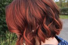 a mid bob done in auburn, with a lot of volume and waves is a stunning idea, bob is the most trendy idea, and auburn is perfect for the fall