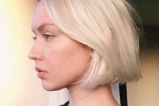 a platinum blonde chin-length bob with a bit of volume is a chic and eye-catching idea to rock