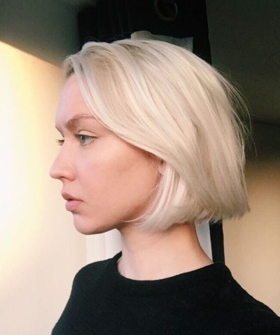 A platinum blonde chin length bob with a bit of volume is a chic and eye catching idea to rock