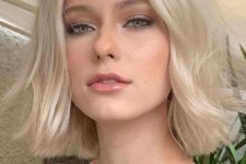 a pretty platinum blonde long bob with a bit of waves and volume is always a stylish solution, it’s always in trend