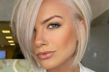 an A-line jaw-length platinum blonde bob with a lot of volume is a cool and catchy idea