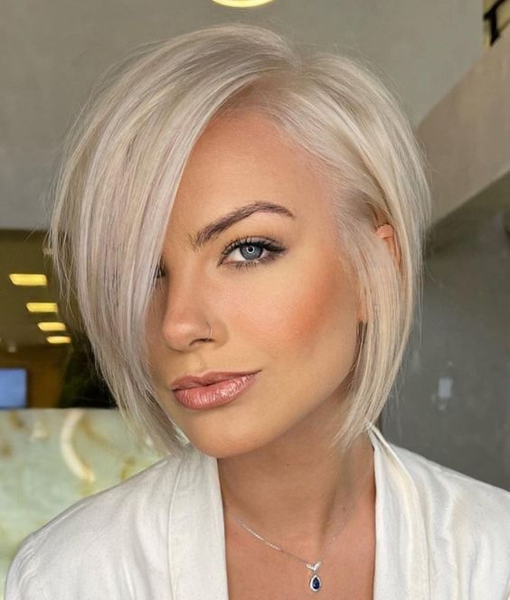 An A line jaw length platinum blonde bob with a lot of volume is a cool and catchy idea