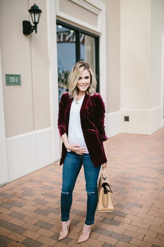 blue skinnies, a white t-shirt, a plum-colored velvet blazer, blush heels and a large bag