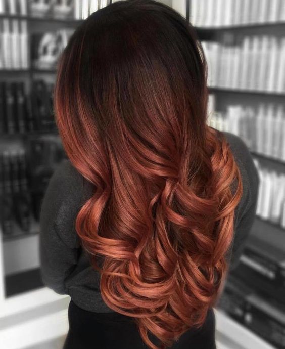 extra long black hair with auburn ombre and waves, with a lot of volume, is a mesmerizing idea, it strikes at once