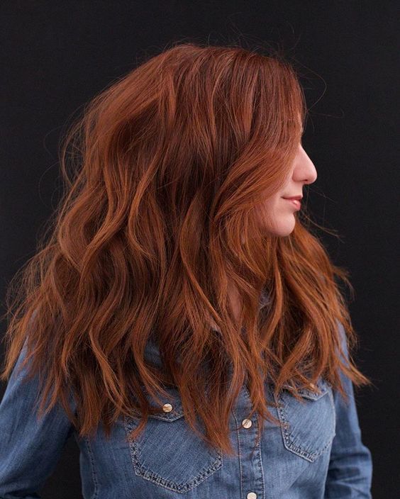 fab long auburn hair with lots of volume and waves down looks fantastic, it's a cool idea for the fall