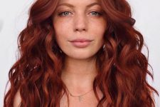 fantastic long auburn hair with waves and a lot of volume is a chic and catchy idea to rock, it brings that wow factor
