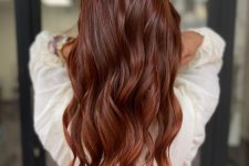 long and pretty auburn hair with waves and a bit of volume is always a stylish and cool idea to try