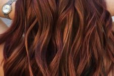 long auburn hair with copper highlights, waves and volume, is always a good and bold idea for the fall