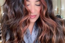 long black auburn hair with auburn balayage and contouring, with waves and a lot of volume, is amazing