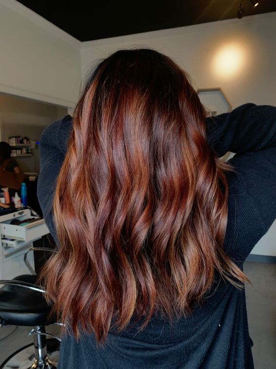 long dark brunette hair with auburn touches and waves, with volume, looks adorable, it will be fantastic for the fall