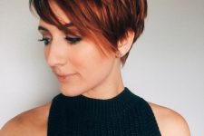 a lovely pixie haircut with copper highlights