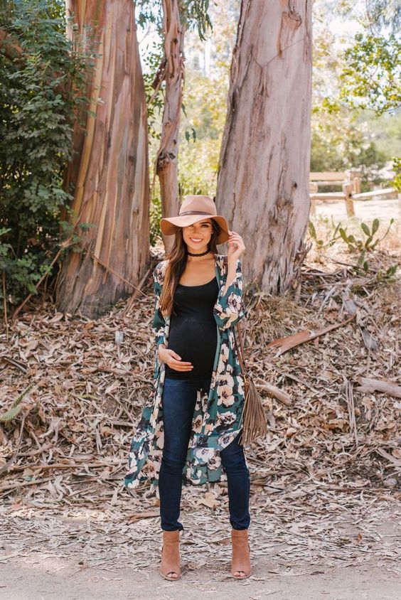 navy skinnies, a black top, a floral kimono, nude booties and a hat for a fall look