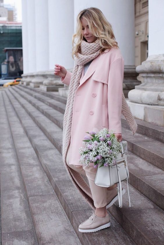 a cute outfit with a pink coat, blush jeans, nude platform shoes, a neutral chunky scarf