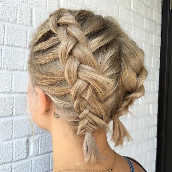 a short blonde bob with two braids on top looks super cute and is very comfy to wear