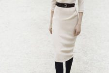 13 a contrasting look with a white pencil skirt and a turtleneck, black tights, shoes and a belt