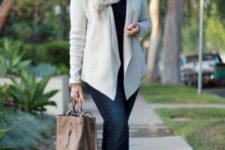 14 navy jeans, a black top, a creamy cardigan, leopard booties and a brown bag plus a scarf