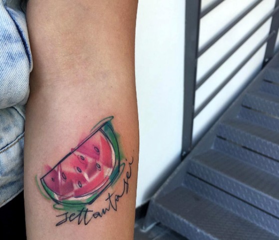 Artistic tattoo on the forearm