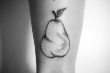 Awesome pear tattoo on the leg