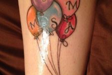 Balloons and bow tattoo idea