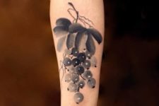 Black and gray tattoo on the forearm