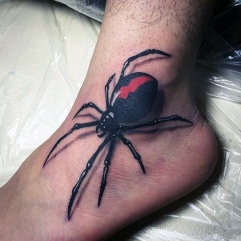 Black and red spider tattoo on the foot