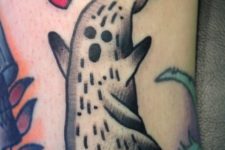 Black and white ghost and red heart tattoo