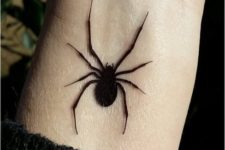 Black spider tattoo idea