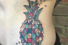 Colorful geometric tattoo on the side