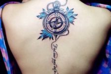 Compass, blue flowers and quote tattoo