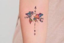 Compass with a world map tattoo