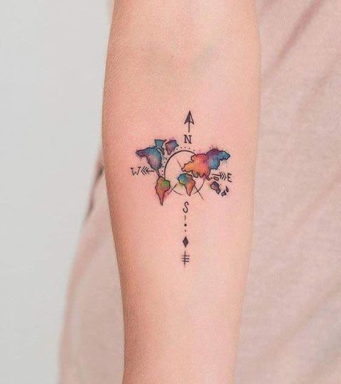 Compass with a world map tattoo