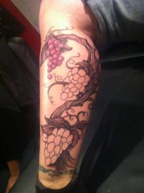 Cool grape tattoo design on the leg