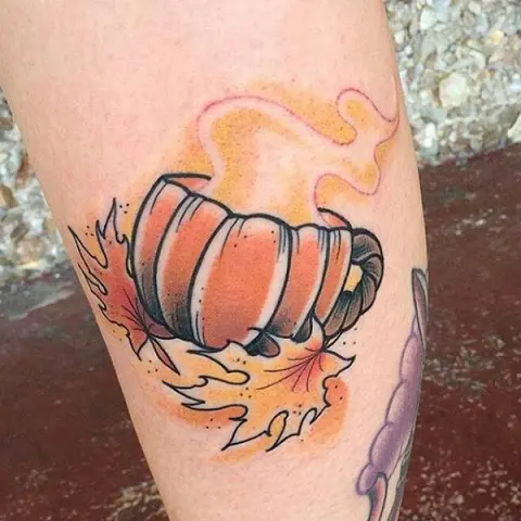 Cup shaped pumpkin tattoo