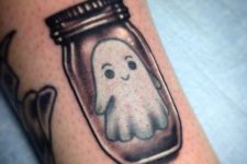 Cute ghost in jar tattoo design