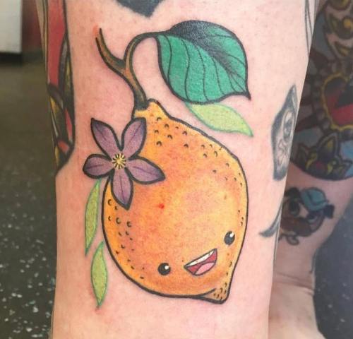 Cute lemon tattoo on the leg