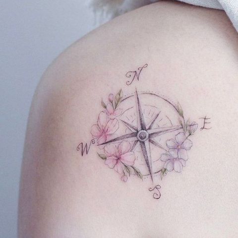 Gentle tattoo design on the shoulder