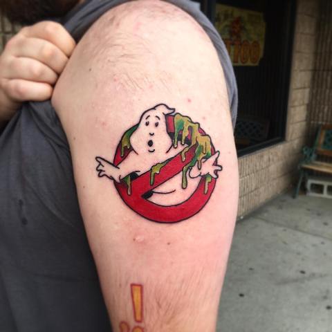Ghostbusters sign tattoo on the shoulder