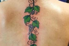 Grape with leaves tattoo on the back