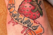 Melting strawberry tattoo on the foot