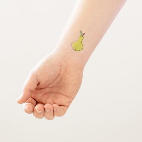 Neon green tattoo on the wrist