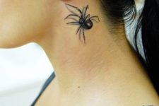 Perfect spider tattoo on the neck
